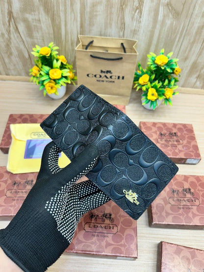 Coach Embossed Signature Leather Bifold Wallet – Black with Gold Logo