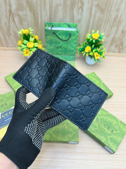 Gucci GG Black Embossed Leather Bifold Wallet
