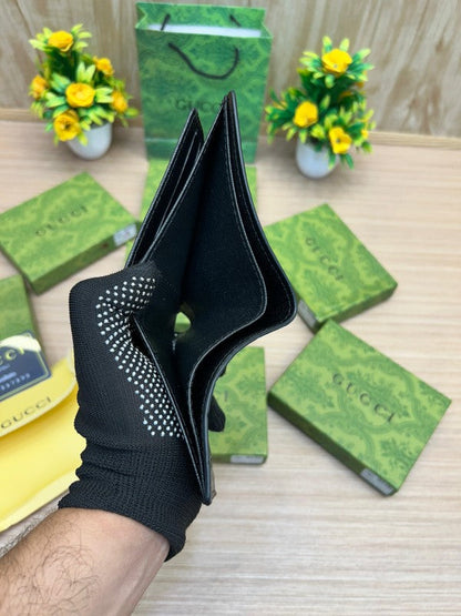 Gucci GG Black Embossed Leather Bifold Wallet