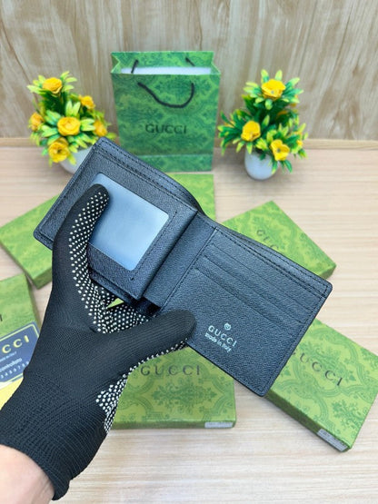 Gucci GG Black Embossed Leather Bifold Wallet