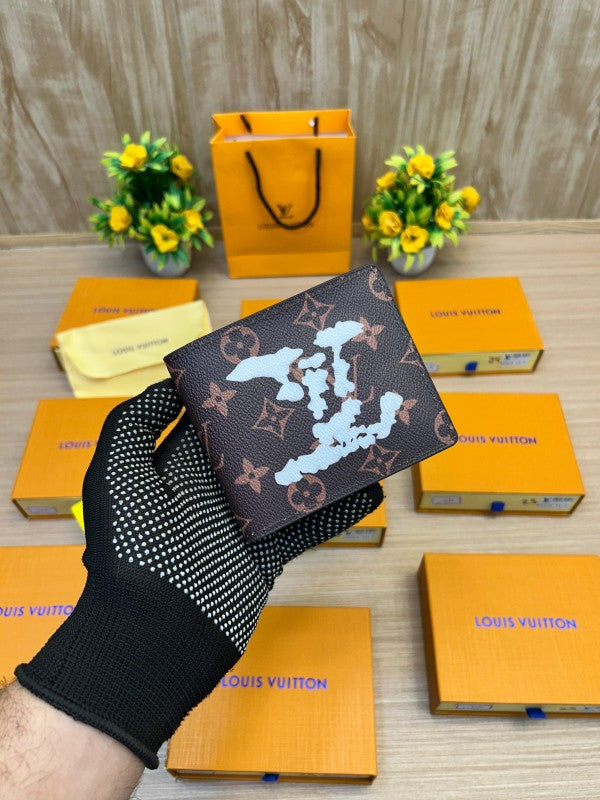 Louis Vuitton Taiga Leather Bi-Fold Wallet – Classic Brown