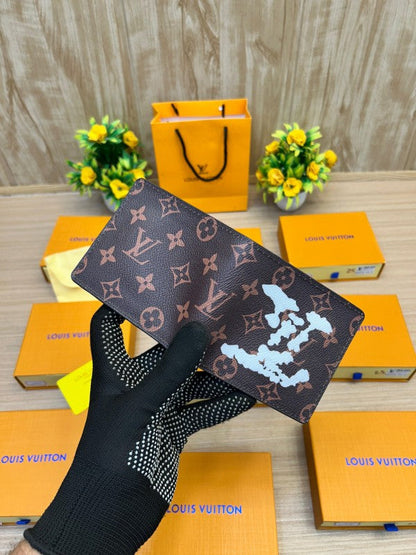 Louis Vuitton Taiga Leather Bi-Fold Wallet – Classic Brown