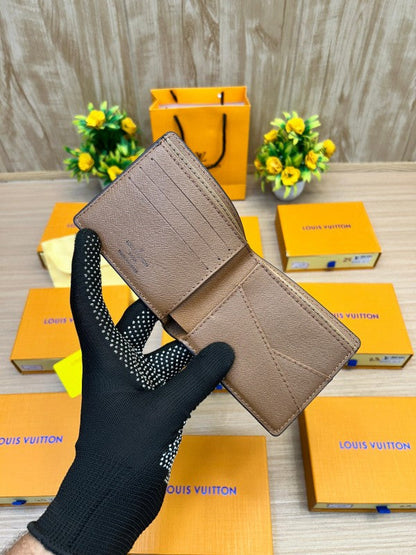 Louis Vuitton Taiga Leather Bi-Fold Wallet – Classic Brown