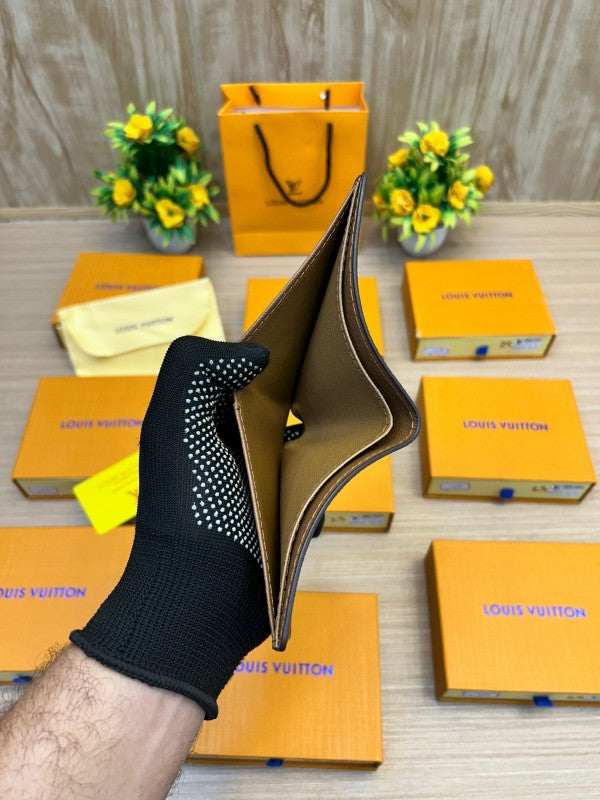 Louis Vuitton Taiga Leather Bi-Fold Wallet – Classic Brown